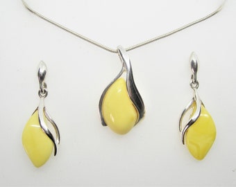 Sterling silver set with yellow egg amber