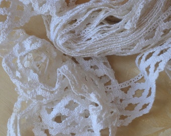 4 yards of unused pure white tape lace, 1 and a half inches deep