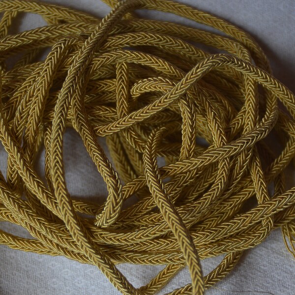 One length of 5 yards antique French gold metal "military/bullion" woven trim, closed mercerie stock