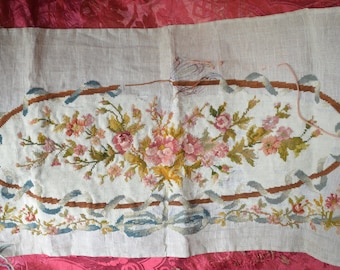 An antique needle work tapestry, floral bouquets, roses and ribbons, unfinished, perfect for re-work
