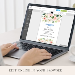 May include: A laptop computer screen displaying a floral bridal shower invitation with the text "Join us for a Bridal Shower in honor of Julia Leighton Saturday, April 9, 2021 at 2PM 123 Betty Lane Brooklyn, New York registered at Target & Amazon"