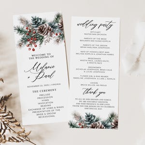 May include: Wedding program featuring elegant calligraphy with the names "Melanie + Darl" and event details. The design includes watercolor pinecones, greenery, and red berries. The program lists the wedding party and ceremony details.