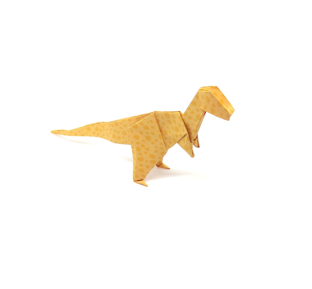 Vélociraptor en origami à pois jaunes – Force et chance en papier ...