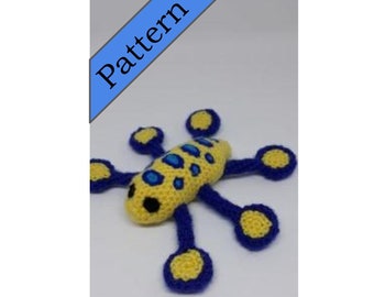 May include: A crocheted yellow and blue octopus with a spotted body and blue tentacles.