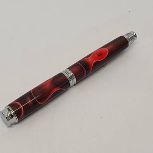 Chrome fountain pen with black and red resin body