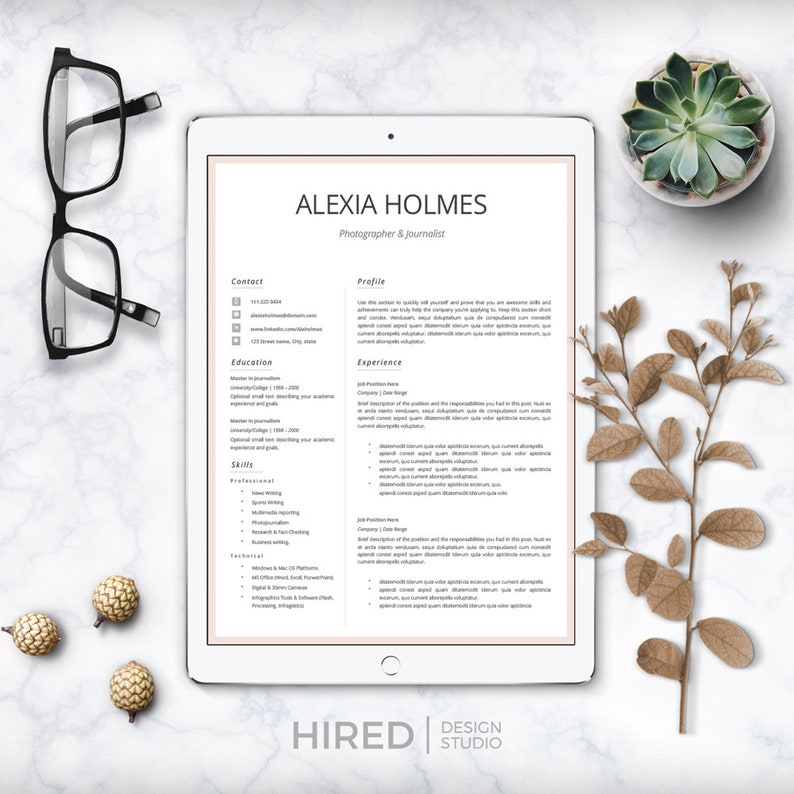 May include: A resume template on a tablet screen with the name Alexia Holmes, Photographer & Journalist, at the top. The resume includes sections for contact information, education, experience, skills, and technical skills.