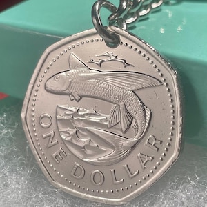 Llaveros de peces voladores, monedas auténticas de 1 dólar de Barbados de 1989, 2000, 2008 y 2015 con el escudo nacional.