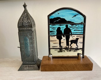 Stained Glass Panel of a Dog and Couple on the Beach. Seagulls. Blue and Amber Textured Glass. Hand Painted. Dog Lover Gift