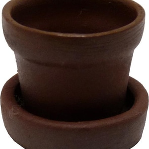 May include: A small, brown, ceramic flower pot with a matching saucer. The pot has a cylindrical shape with a slightly flared rim. The saucer is a shallow, circular dish. The pot and saucer are a solid, earthy brown color.