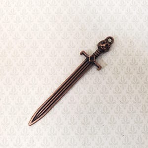 Miniature Sword Cat's Head Jaguar Metal with Bronze Finish 2 5/8" Long