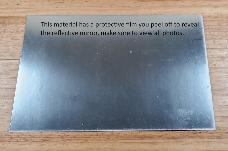 Spiegelmaterial mit Schere geschnitten, selbstklebend, 15 x 23 cm Schutzfolie Bild 1