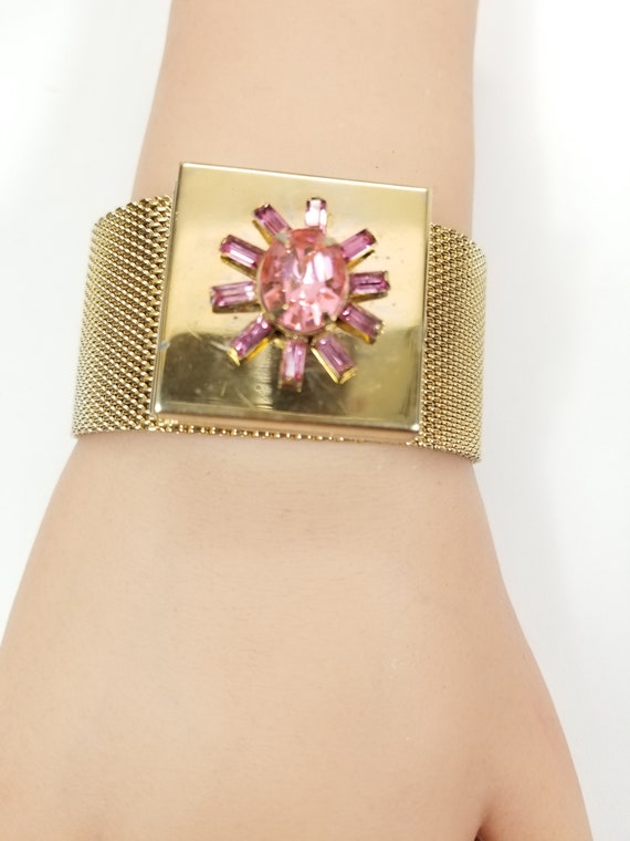 Unsigned COMPACT BRACELET with Pink Starburst on … - image 1