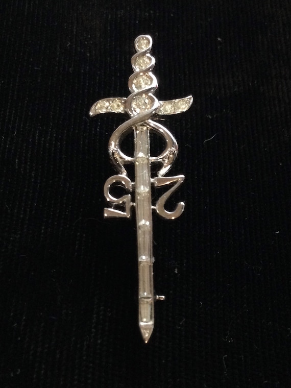Caduceus brooch shop