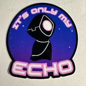 May include: A round sticker with a purple and blue gradient background. The sticker features a black silhouette of a robot with a white eye and the text "It's only my ECHO" in pink.