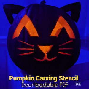 May include: A carved pumpkin with a cat face design, illuminated from within, creating an orange glow. The pumpkin features cut-out eyes, nose, and whiskers. Text at the bottom reads "Pumpkin Carving Stencil Downloadable PDF".