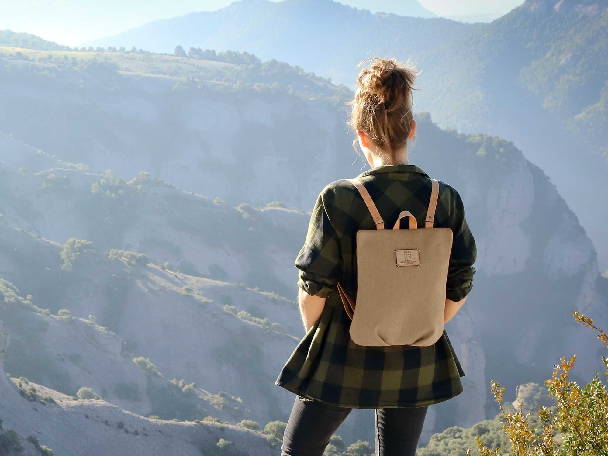 beige canvas backpack