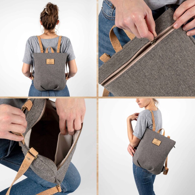 May include: A grey canvas backpack with cork accents and a zip closure. The backpack has a small pocket on the front and adjustable straps.