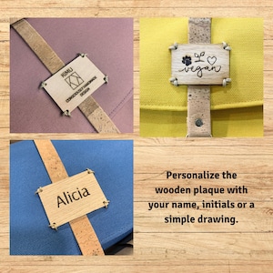 May include: Three different cork straps with wooden plaques. The plaques are personalized with the words "KIMU", "vegan", and "Alicia".