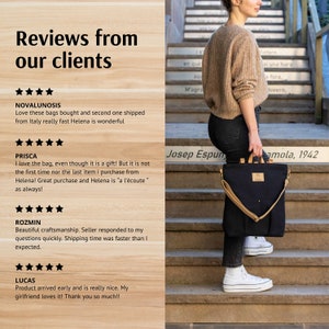 May include: Customer reviews for a black canvas tote bag with brown leather straps and a brown leather flap. The bag is worn by a person standing on a set of stairs.