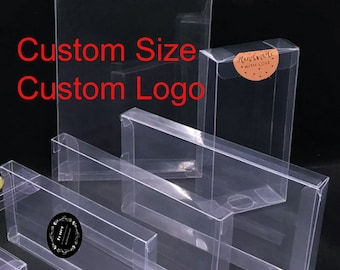 May include: Clear plastic boxes of various sizes, stacked and arranged on a black surface. The boxes are designed for packaging small items, such as jewelry, candles, or other crafts. The boxes are made of clear plastic, which allows the contents to be visible. The boxes are also stackable, which makes them ideal for storage and display.