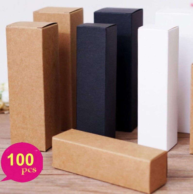 May include: A set of 100 cardboard boxes in brown, black, and white. The boxes are all the same size and shape, and they are stacked on top of each other. The boxes are perfect for packaging small items, such as jewelry, cosmetics, or candles.
