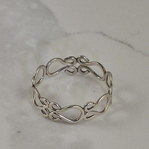 Stylish open filigree ring in sterling silver - any size you want