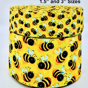 May include: A roll of yellow ribbon with a repeating pattern of black and yellow bees. The ribbon is available in 1.5" and 3" sizes.