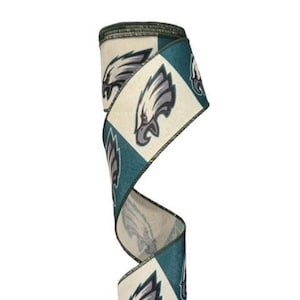 May include: A 2.5 inch wide wired ribbon with a green and cream checkered pattern featuring the Philadelphia Eagles logo.