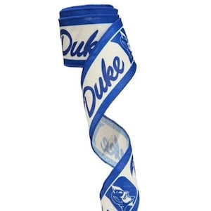 May include: Blue and white ribbon with the word "Duke" repeated on it. The ribbon also features a blue Duke mascot logo.
