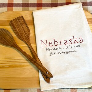 Nebraska-Nebraska Slogan-It's Not For Everyone-Hand Embroidered Tea Towel-Flour Sack Kitchen Towel-Handmade-Kitchen Humor