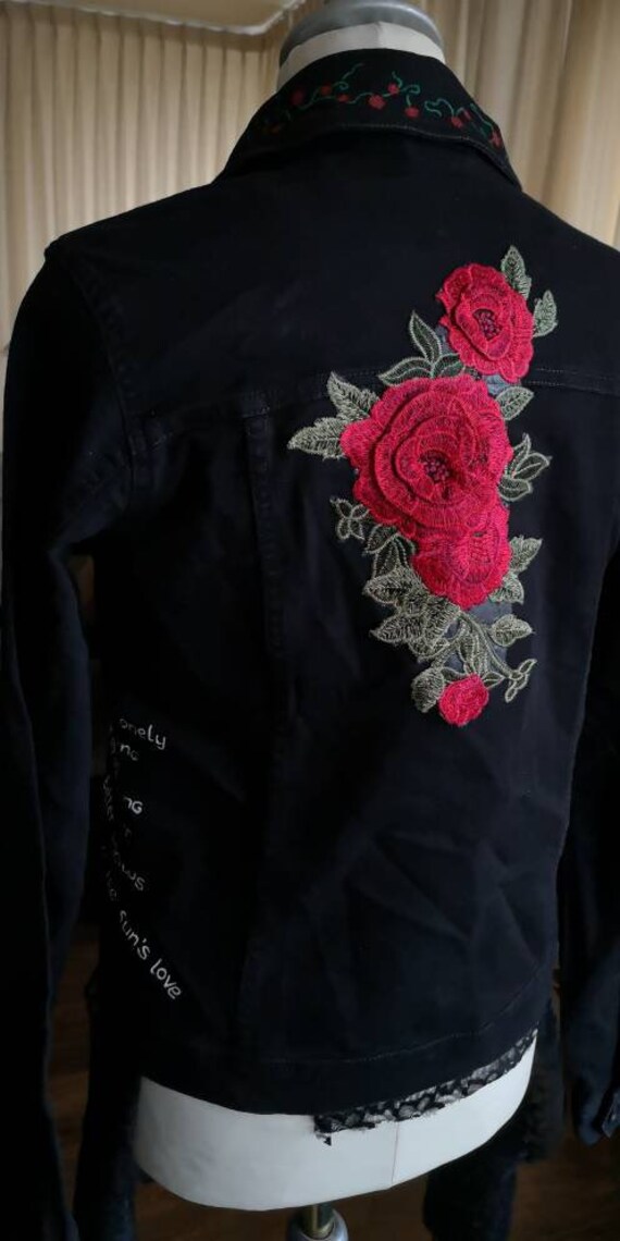 black denim jacket with roses