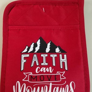 May include: Red quilted pot holder with a white design that says "Faith can move mountains" with a black mountain range graphic.