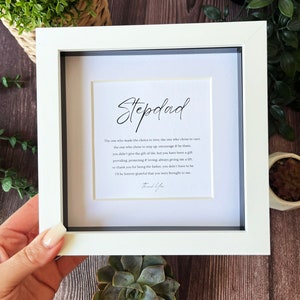 May include: A framed print with a white background and black text. The text reads "Stepdad" and a poem about the love and support of a stepdad. The poem ends with "Thank You".