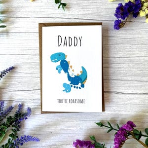 Gepersonaliseerde Vaderdag-voetafdrukkaart van baby/kind: dinosaurus-, raket- of hamerontwerp: leuk aandenken eerste vaderdagcadeau. DINO