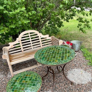 Moroccan Round table outdoor dining table or indoor table with , Mosaic Table , a large round table top, and iron legs.