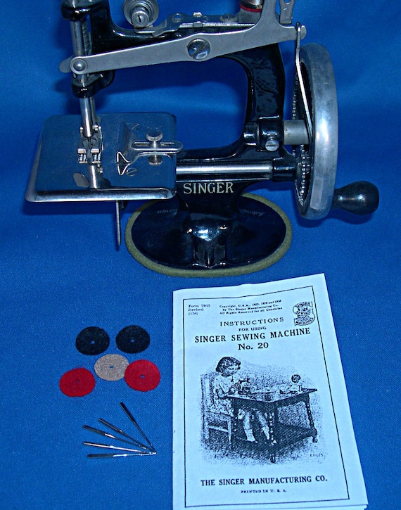 Singer Toy Sewing Machine Needles, Copy of Instructions and Spool Felts  Singer Toy Model 20 Oval Base 7 Spokes NO MACHINE INCLUDED 