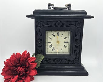Vintage Black Wood Mantel Clock: Carved Floral Design, Roman Numerals
