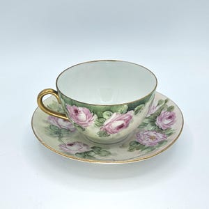 Antique O & E G Royal Austria Floral Teacup and Saucer, Hand Painted,  Pale Yellow Background, Pink Roses,  Signed Jessie Barker, 24K Gold