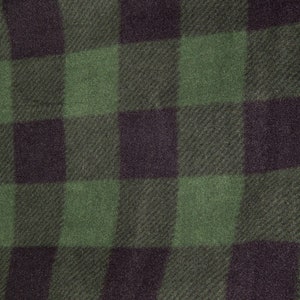 Op de afbeelding: Groen en zwart geruit stof met een zachte, pluche textuur.