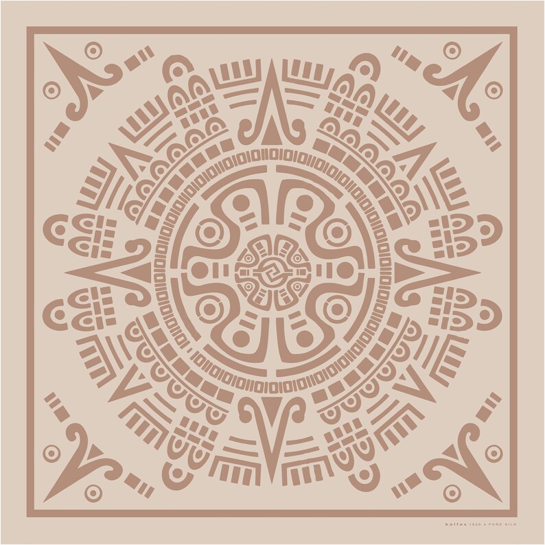 May include: A square, tan-colored silk scarf featuring a detailed, symmetrical design in a darker brown hue. The central motif resembles a stylized sun or calendar, with intricate geometric patterns and symbols. The scarf's border is a darker shade of brown.
