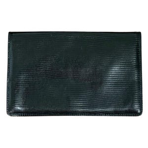 May include: A rectangular black wallet featuring a textured lizard-skin pattern across the entire surface. The wallet has a slim, flat profile with clean, straight edges and a glossy finish that reflects light across its horizontal lines.