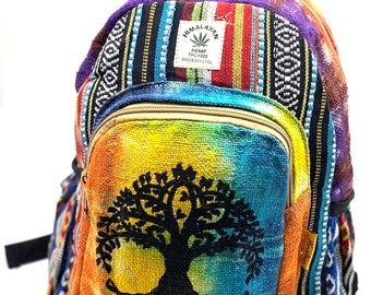 May include: Multicolored hemp backpack with a tie-dye design and a tree of life graphic. The backpack has a small patch that says "Himalayan Hemp THC Free Made in Nepal".