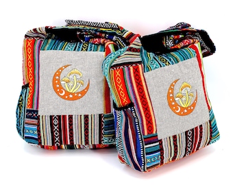 May include: Two colorful, multi-striped tote bags with a crescent moon and mushroom design. The bags are made of a woven fabric and have a drawstring closure.
