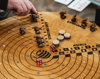 Scratched Horses Game made from a whiskey barrel with magnetized horses