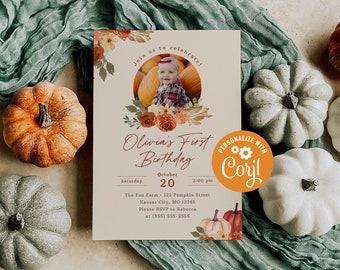 May include: A beige invitation card with a watercolor illustration of pumpkins and flowers. The text reads "Join us to celebrate! Olivia's First Birthday, Saturday, October 20, 2:00 pm, The Fun Farm - 123 Pumpkin Street, Kansas City, MO 12345, Please RSVP to Rebecca at (555) 555-5555". A photo of a baby girl is in a circle on the card. The text "PERSONALIZE WITH CORYL" is in a circle with a gear icon.