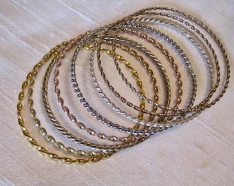 Lot of Eight Twisted Metal Bangles Bracelets. Silver, Gold, Brass & Copper Tone. Twisted Stackable Bangles Bracelets. Vintage 80's.