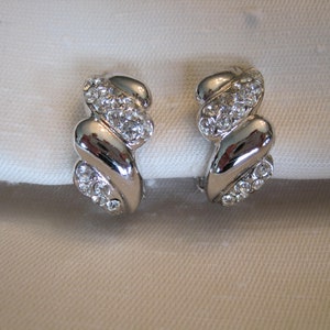 Vendome Signed, Shine Silver Tone, Clear Glass Rhinestones, Half Hoop Shape, Clip on Earrings.