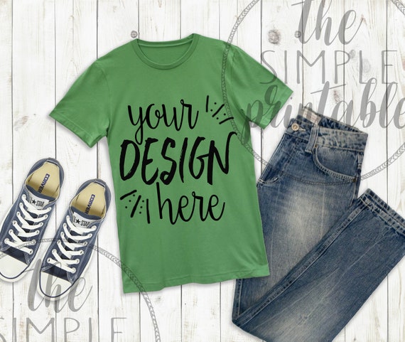 T-Shirt Mockup Bella Canvas 3001 Green Shirt On Wood T-Shirt Mockup Bella Canvas 3001 Green Shirt On Wood