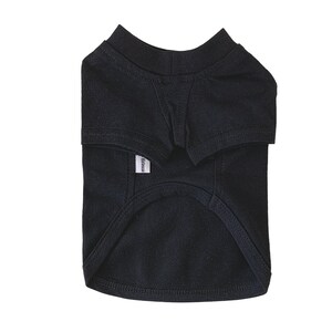 May include: Black dog t-shirt with a white "Harness" label.