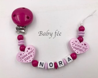 Girl's pacifier clip with personalized pink first name I love mom dad